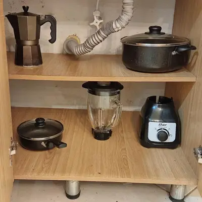 a kitchen shelf with a blender and a toaster at Tu espacio cómodo, elegante y céntrico con balcón 401 in Medellín