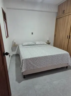 a bedroom with a large bed in a room at Apartment in Tamesis in Támesis