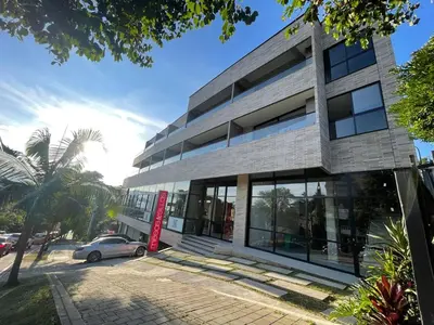 a building with a car parked in front of it at Apartment with a balcony El Tesoro in Medellín