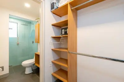 a bathroom with a toilet and a shower at Homely Penthouse in Provenza in Medellín
