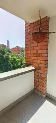 a brick wall next to a window on a balcony at Exclusive penthouse in Provenza in Medellín