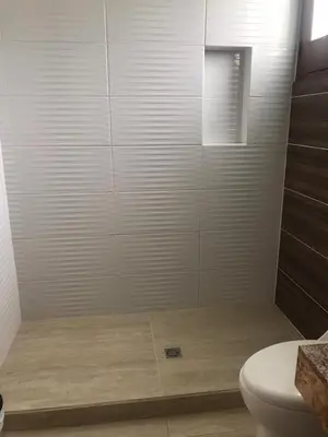 a bathroom with a white shower with a toilet at Cauca Viejo parque Aliciadorada in Jericó