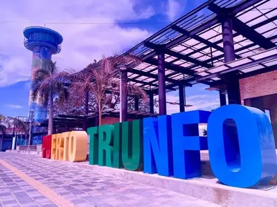 a sign that says rrupal in front of a building at Alojamiento Sol Naciente in Puerto Triunfo