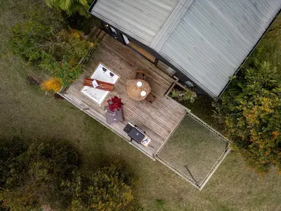 an overhead view of a patio with a table and chairs at Retreat Villas Llanogrande By CHX in Rionegro