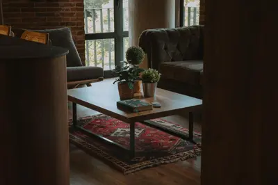a living room with a coffee table with plants on it at 10-36 Dieztreintayseis Short & Long Term Living in Medellín