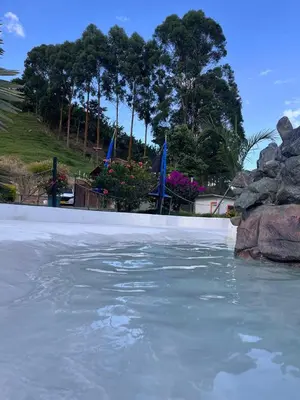 a pool of water in a swimming pool at finca hotel ganbaru