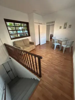 a living room with a couch and a table at Apartamento Rosa colonial in Medellín