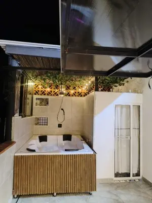 a bathroom with a tub in a room at Apartamento con jacuzzi in Santa Fe de Antioquia
