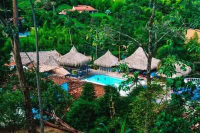 an aerial view of a resort with a swimming pool at Hotel Hacienda La Bonita in Amagá