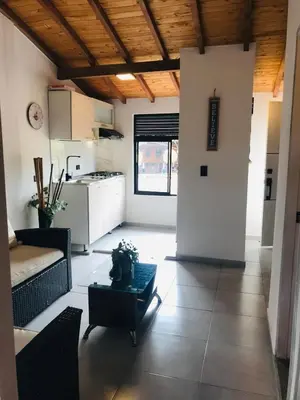 a living room with a couch and a table at Apartamento en Rionegro in Rionegro