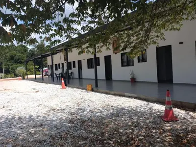 a building with flood water in front of it at JyM apartaestudios in Doradal