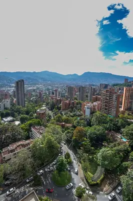 an aerial view of a city with cars at Cozy apt in Poblado The best area Great view in Medellín