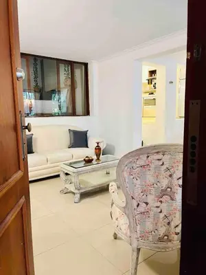 a living room with a couch and a table at Casa Amsterdam with Jacuzzi in Poblado Medellín in Medellín