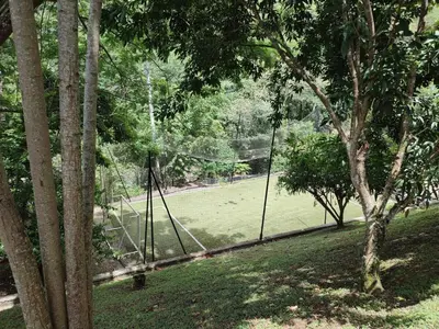 a swing set in a park with a field at San Jeronimo - Apartamento - Hospedaje in San Jerónimo