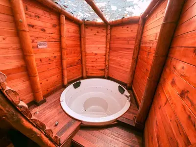 a toilet in the inside of a wooden sauna at Solvae EcoHotel in San Jerónimo
