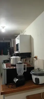 a kitchen with a counter with a blender on a table at Central apartment with air conditioning in Medellín