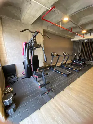a gym with several exercise bikes in a room at Class 48 Exclusivo y elegante apartamento in Sabaneta