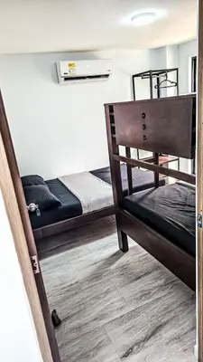 a room with two bunk beds in a room at La Fonte di Luce in Santa Fe de Antioquia