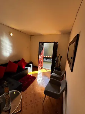 a living room with a couch and a table at Apartamento Hayalón in Betania