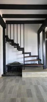 a room with a staircase and a bench in a building at Casa Campestre Tara in Barbosa