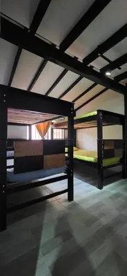 a room with two bunk beds in a room at Casa Campestre Tara in Barbosa
