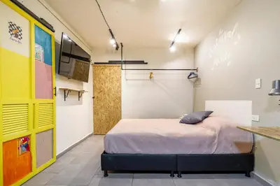 a bedroom with a bed in a room at Envigado Centro Piso 1 in Envigado