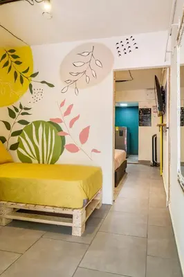 a hospital room with two beds and a hallway at Envigado Centro Piso 1 in Envigado