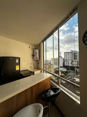 a bathroom with a large window with a view of a city at Apartamento moderno ubicado en zona exclusiva in Manizales