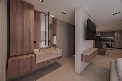 a large bathroom with a tub and a television at Modern & Elegant Loft in El Poblado 217 in Medellín