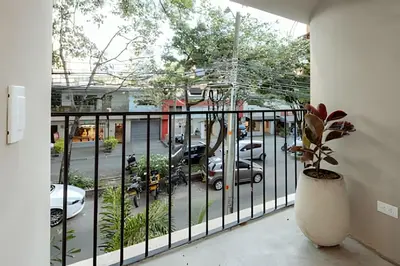 a balcony with a view of a parking lot at Casa Fiora Oasis in Medellín