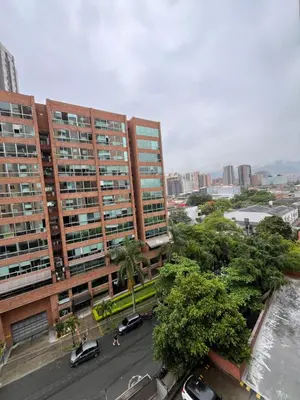 an aerial view of a city with tall buildings at Hermosa habitación con excelente ubicación in Medellín