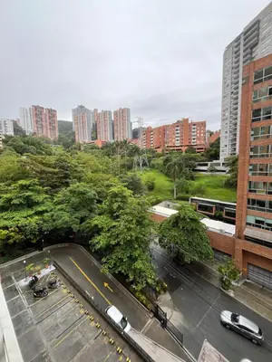an aerial view of a parking lot in a city at Hermosa habitación con excelente ubicación in Medellín