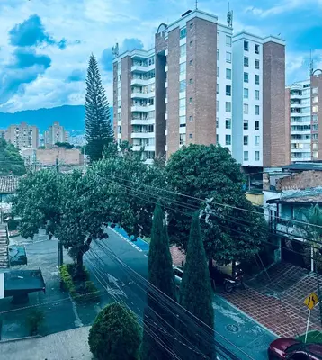 a view of a city with tall buildings at Apartamento balcón laureles estadio ED Milagros in Medellín