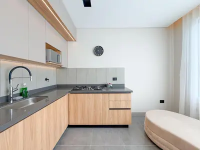 a kitchen with a sink and a stove at Apartamento de lujo a 3 minutos del Aeropuerto JMC 301 in Rionegro