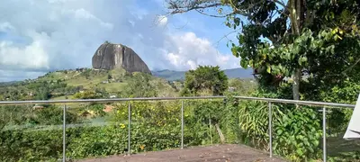 a view of sigiriya rock from a balcony at Casa de Campo Bheta in Guatapé
