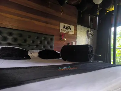 a bedroom with a bed with two pillows on it at San Sebastián barbosa in Barbosa