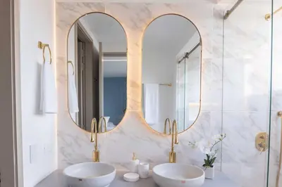 two sinks in a bathroom with a large mirror at Exclusive Luxury Apartment - Poblado Medellín in Medellín