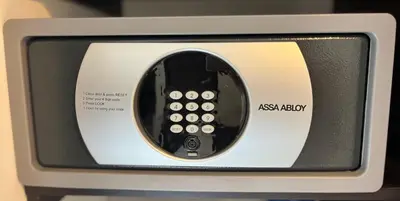 a television with a remote control on top of it at Suites - Llanogrande in Rionegro