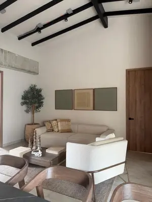 a living room with a couch and a table at Moderno y luminoso apartamento de 3 habitaciones 314 in Medellín
