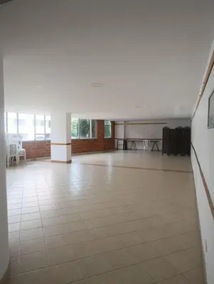 a large room with a tile floor and a white ceiling at Perfect place to relax! in Medellín