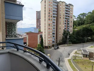 a view of a street from a balcony with buildings at Perfect place to relax! in Medellín