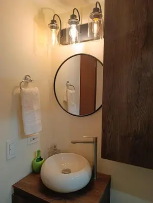 a bathroom with a sink and a mirror at Perfect place to relax! in Medellín