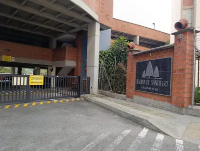 a entrance to a building with a sign on it at Perfect place to relax! in Medellín