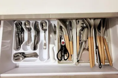 a drawer filled with lots of utensils at Plaza Corales Manizales in Manizales