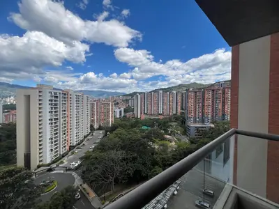 a view of a city from a balcony at Apartamento Medellín in Medellín