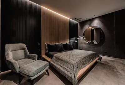 a bedroom with a bed and a chair and a mirror at Luxurious Farm House Finca Libia in Guarne