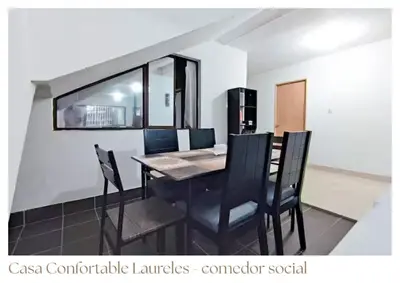 a dining room with a table and chairs at Casas confortable Laureles in Medellín