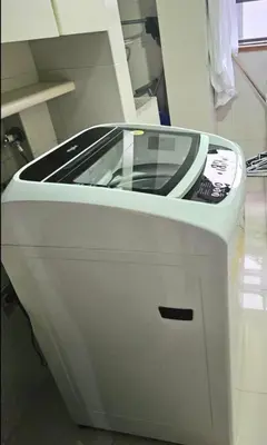 a machine with a cell phone on top of it at master bedroom in Medellín