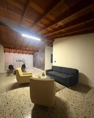 a living room with a couch and two chairs at CASA GAMA Your spring in Medellín in Medellín