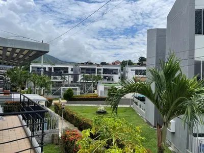 a view of the courtyard of a building at Apartasol santafe live in Santa Fe de Antioquia